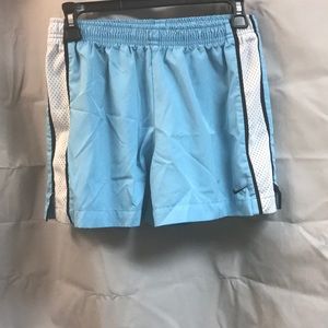 Blue and pink Nike shorts.